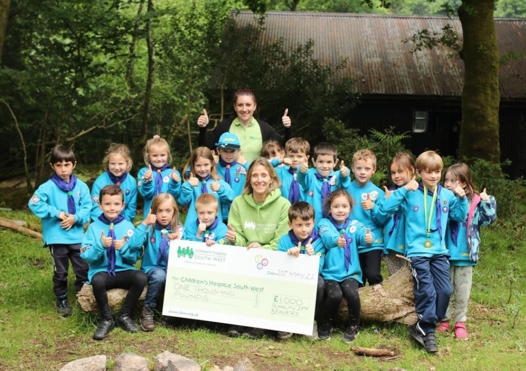 Plymouth Beavers group hand over their £1000 to Amanda and Annabel from CHSW