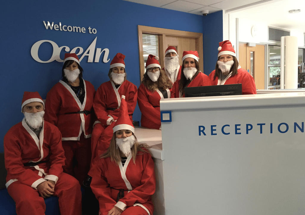 Group of people dressed as Santa Claus for CHSW Santas on the Run