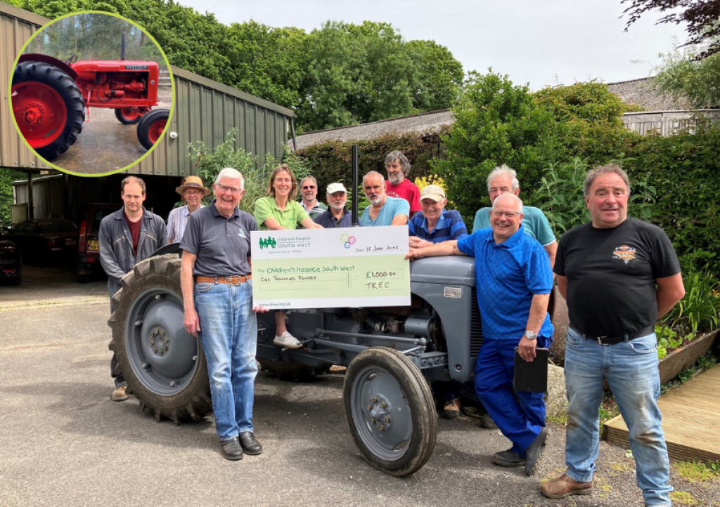 Tamar Engineering and Restoration Club handover their cheque to Annabel from CHSW