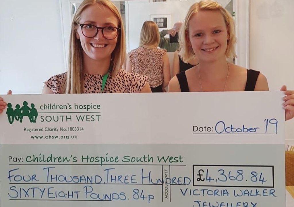 Cheque presentation following Victoria Walker Jewellery charity raffle