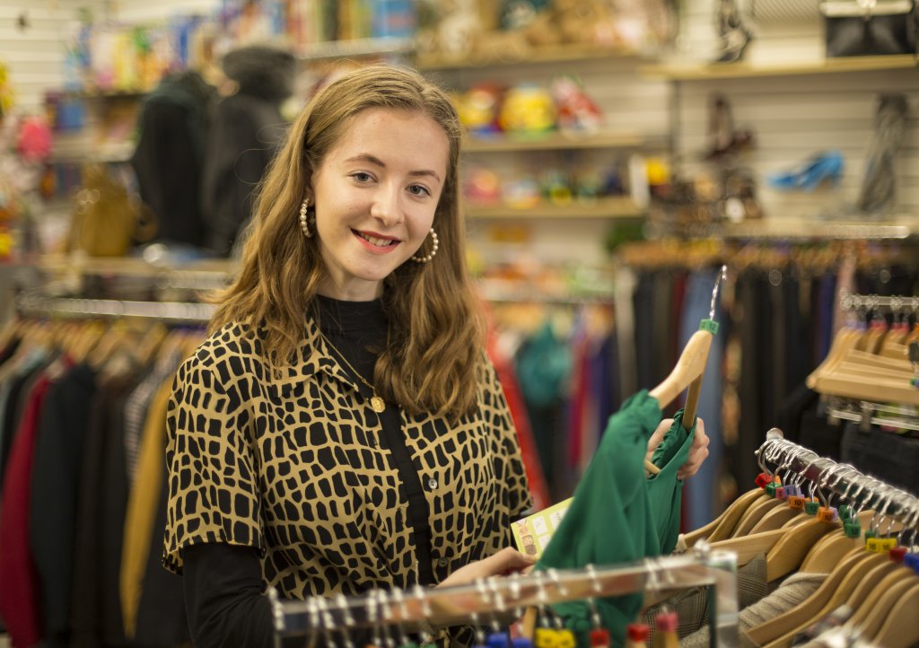 University student Niamh O'Riordan-Mitchell volunteers in the Sidwell Street charity shop. Tim Lamer