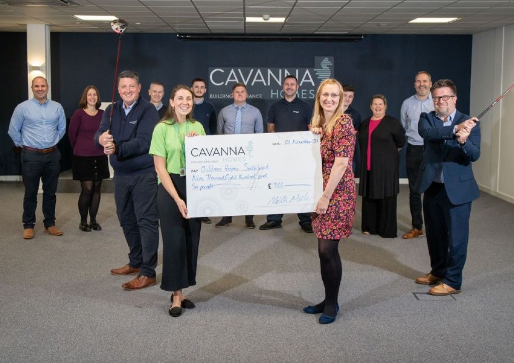 Mary Gray from Children’s Hospice South West with members of the Cavanna Homes team