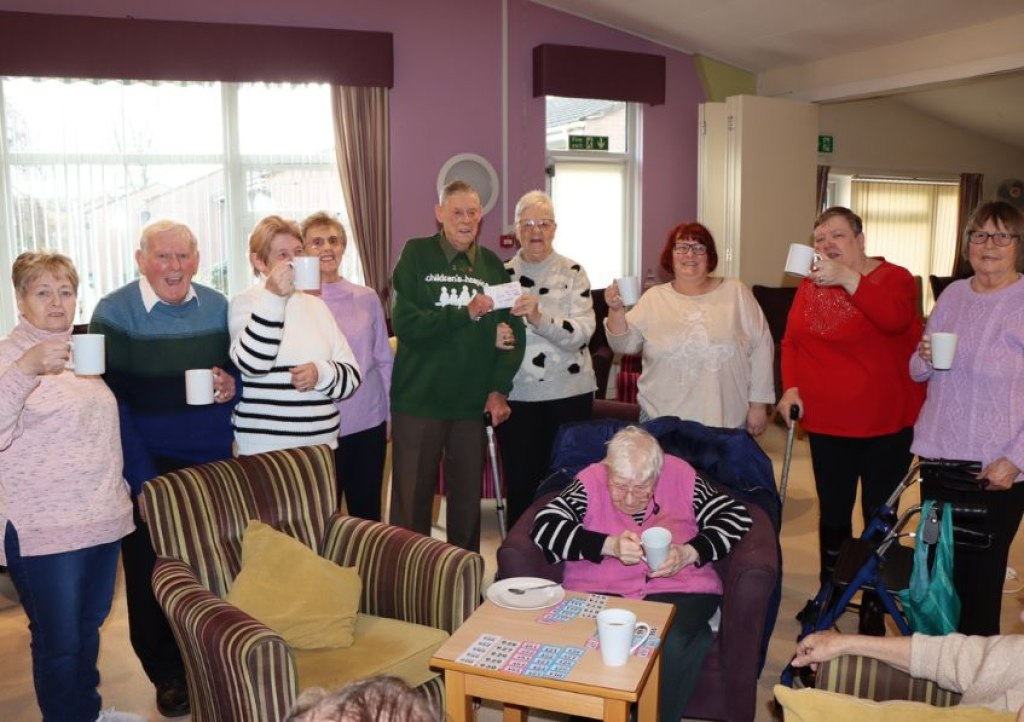 CHSW volunteer Ray Hales receives the fundraising cheque on behalf of the charity. Pic: CHSW