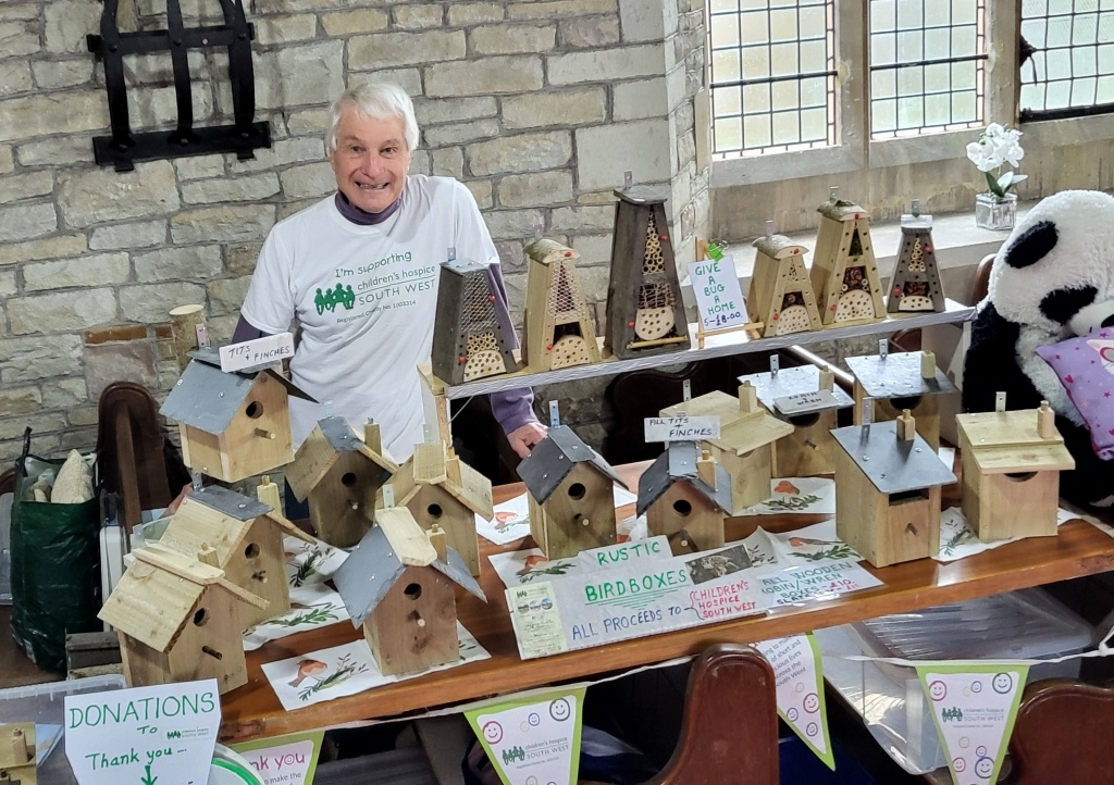 Steve Kerner with the bird boxes and bug houses 