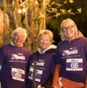 Three smiling women at Moonlight Memory Walk Clevedon