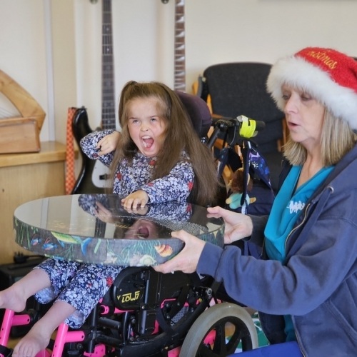 Girl in music therapy session