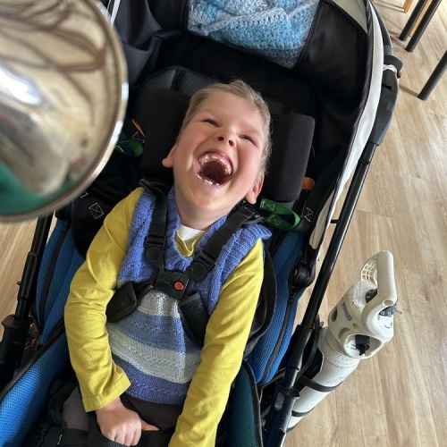 Boy enjoying music therapy