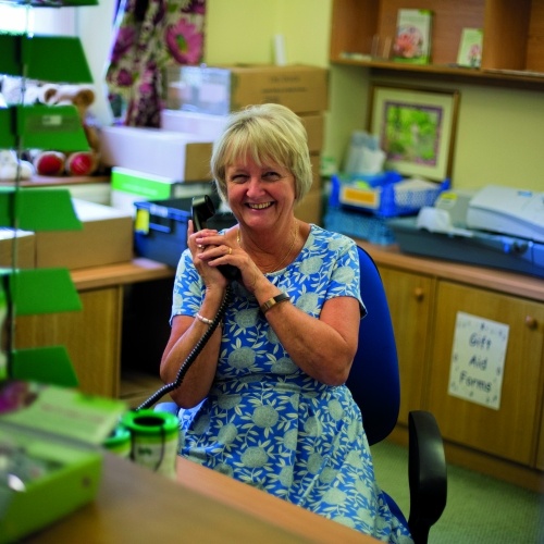 Smiling woman in an office