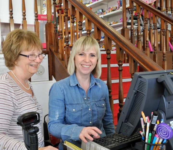 Volunteers working on the till 