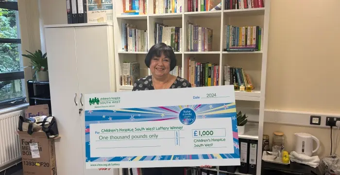Kim with her cheque