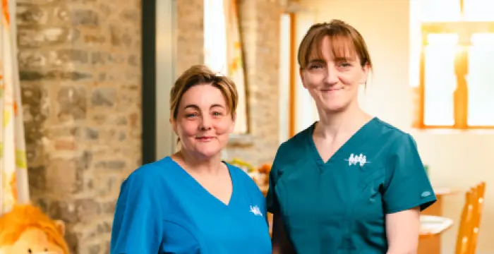 Two CHSW nurses smiling at the camera