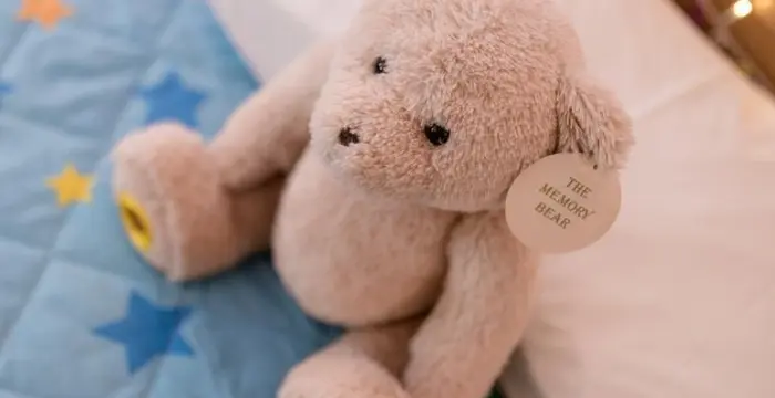 Memory Bear on child's bed