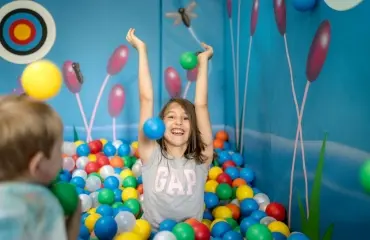 Girl in the soft play at Little Bridge House