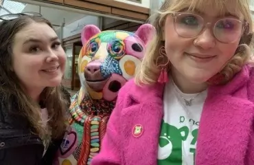 Two young ambassadors with a bear