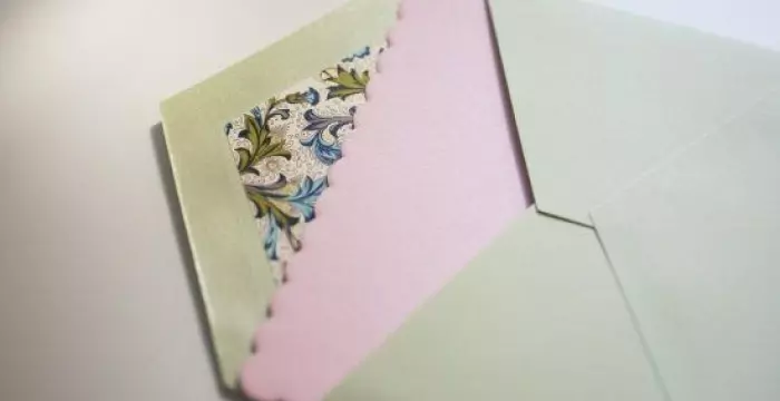 Greenting card envelope with pink paper inside